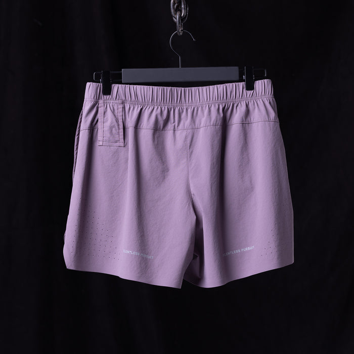 flatlay WN'23 6" Perforated Short in lavender purple, back view