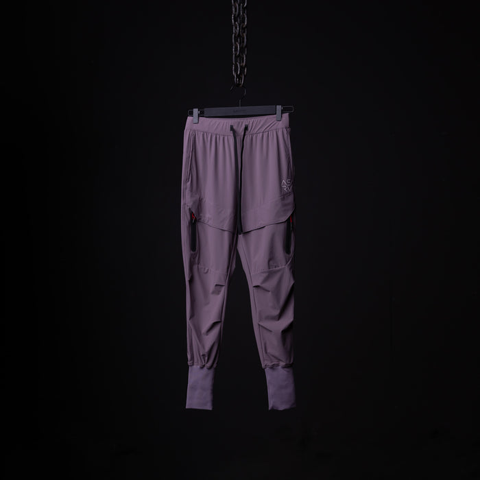flatlay Cyber Tech High Rib Jogger in mauve purple, front view