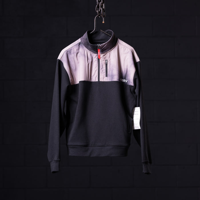 WN'23 Panel Quarter Zip Jacket in black and lavender, displayed on hanger against dark background