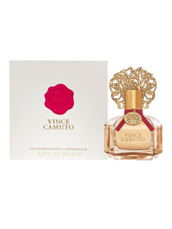 Vince Camuto Women 3.4 oz Eau de Parfum Spray, presented in a chic bottle with a gold cap and red ribbon beside a white box adorned with a pink wax seal logo—a refined Vince Camuto fragrance highlighted by subtle leather notes for an elegant finish.