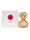 Vince Camuto Women 3.4 oz Eau de Parfum Spray, presented in a chic bottle with a gold cap and red ribbon beside a white box adorned with a pink wax seal logo—a refined Vince Camuto fragrance highlighted by subtle leather notes for an elegant finish.