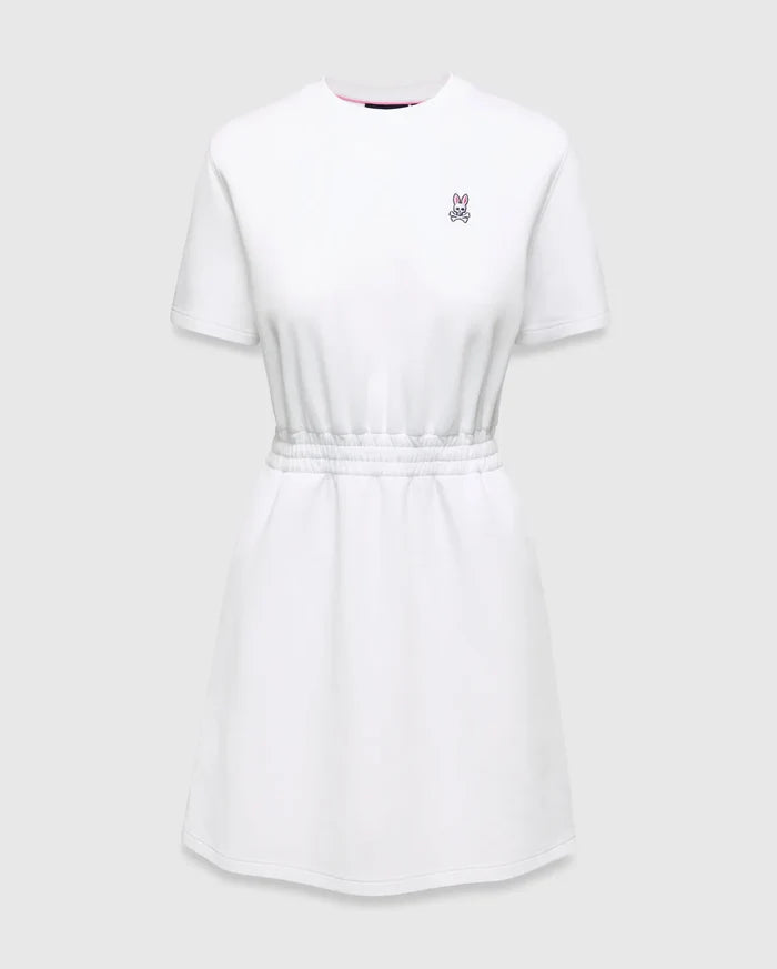 Womens Penelope Dress: White jersey dress with a relaxed fit, elasticated waist, and small pink embroidered Psycho Bunny skull logo on the left chest, accented with a pink neckline trim.