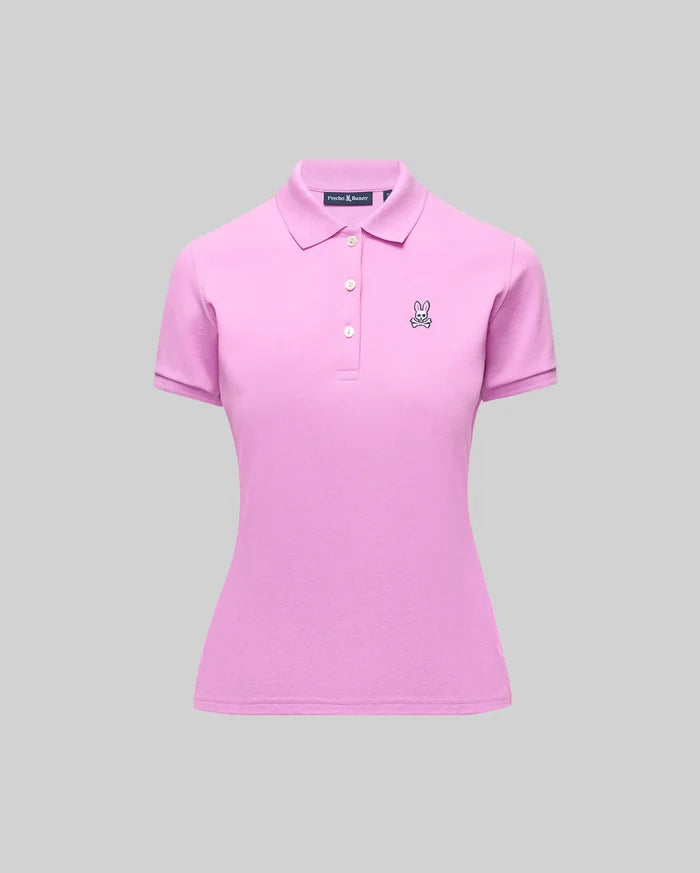 Womens Pique Polo, a slim fit pink pique knit shirt with a 3-button placket, ribbed collar/cuffs, and a small embroidered black/white Psycho Bunny skull logo on the left chest.
